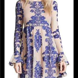 Never worn for love and lemons mini dress, size small